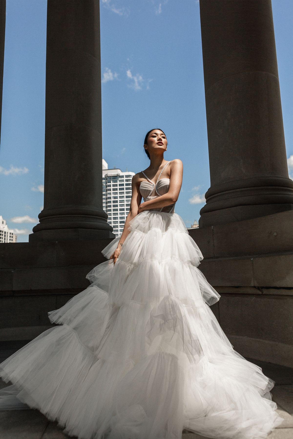 Princess wedding dress Liam by Blammo-Biamo with fluffy multi-layered skirt and bodice embroidered with straps at Dell'Amore Bridal, Auckland, NZ 9