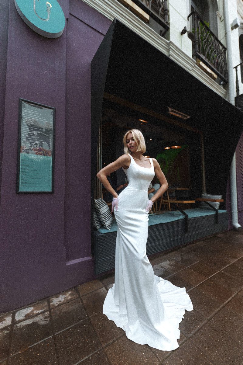 simple fitted satin wedding dress Casablanka with detachable skirt by Rara Avis at Dell'Amore Bridal, Auckland, NZ. 3