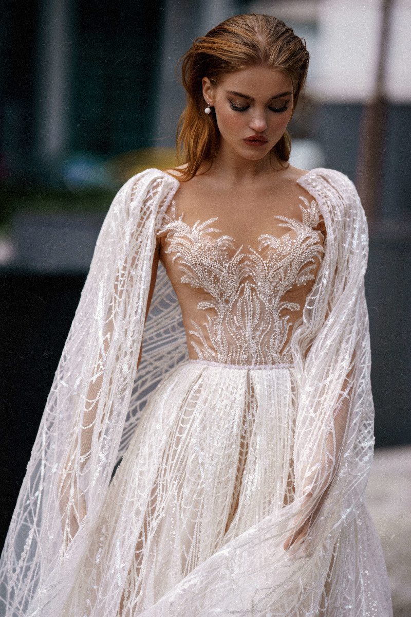 Rara Avis A-silhouette wedding dress Kindia with cape sleeves at Dell'Amore Bridal, NZ. 1