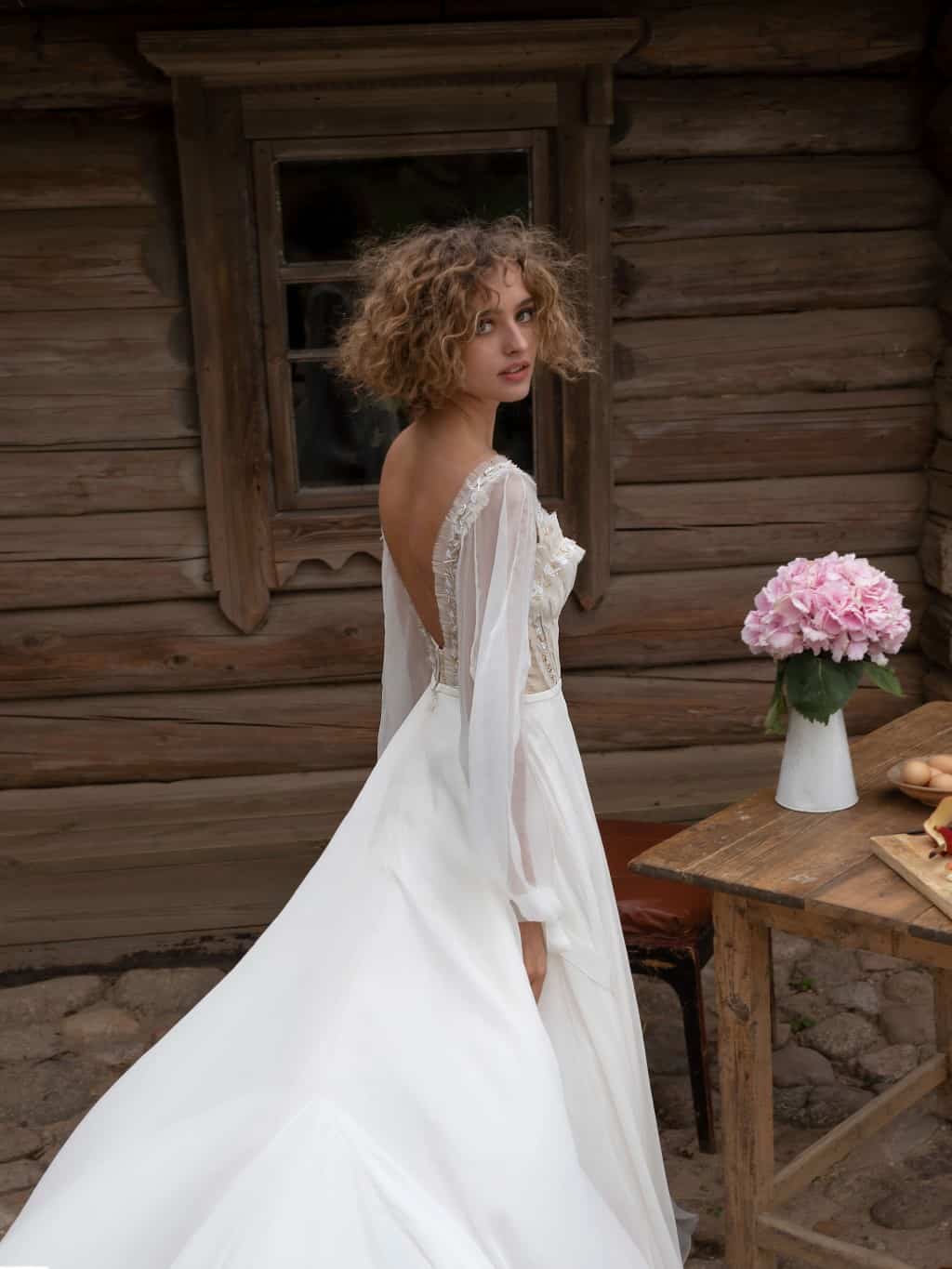 A line chiffon wedding dress Lakrima with long sleeves by Rara Avis at Dell' Amore Bridal, Auckland, NZ. 4