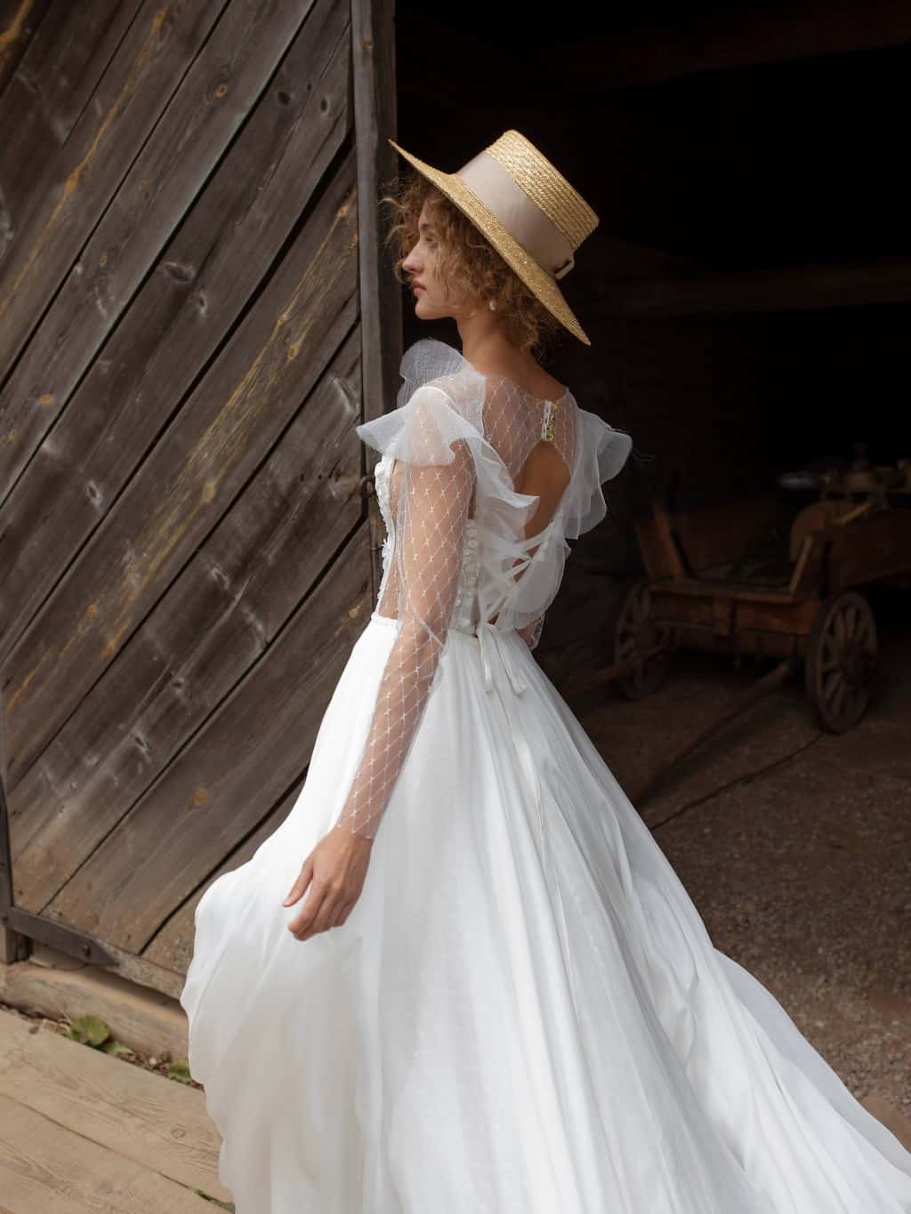 A line lace tulle wedding dress Melentia with long sleeves by Rara Avis at Dell' Amore Bridal, Auckland, NZ. 4