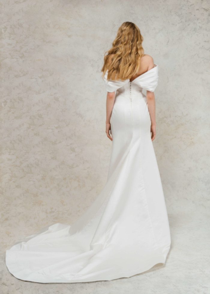 Rara Avis fitted off shoulder simple wedding dress Mirta with a high cut at Dell'Amore, Auckland, NZ. 4