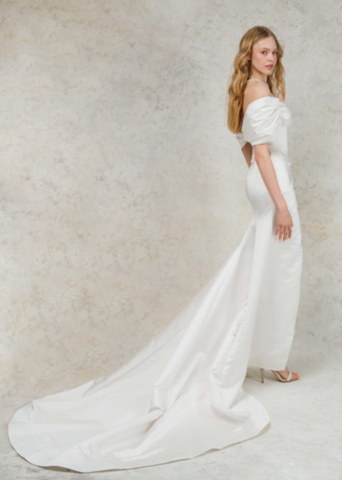 Rara Avis fitted off shoulder simple wedding dress Mirta with a high cut at Dell'Amore, Auckland, NZ. 3