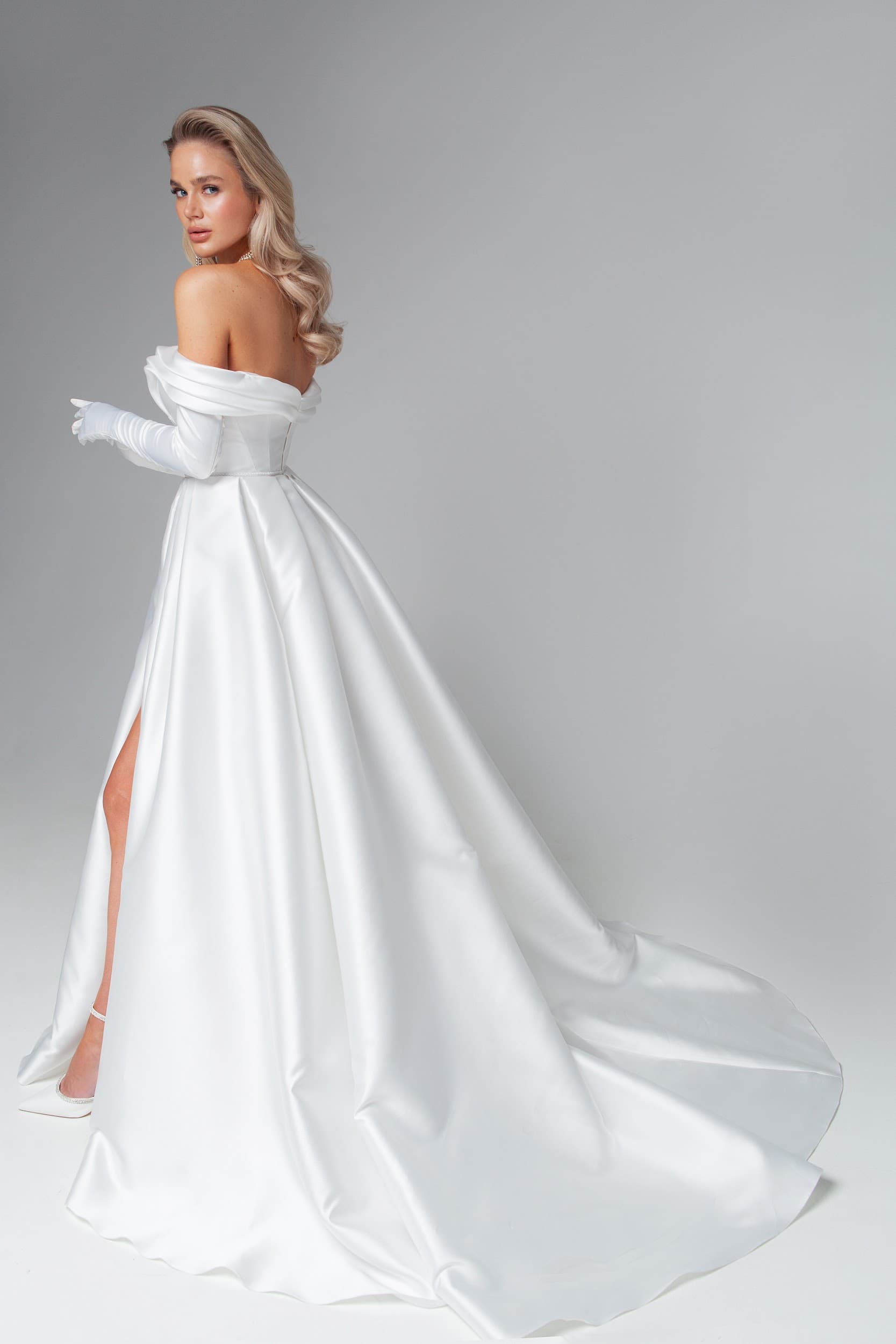 Rara Avis satin off-shoulder wedding dress Rhine at Dell'Amore Bridal, NZ. 6