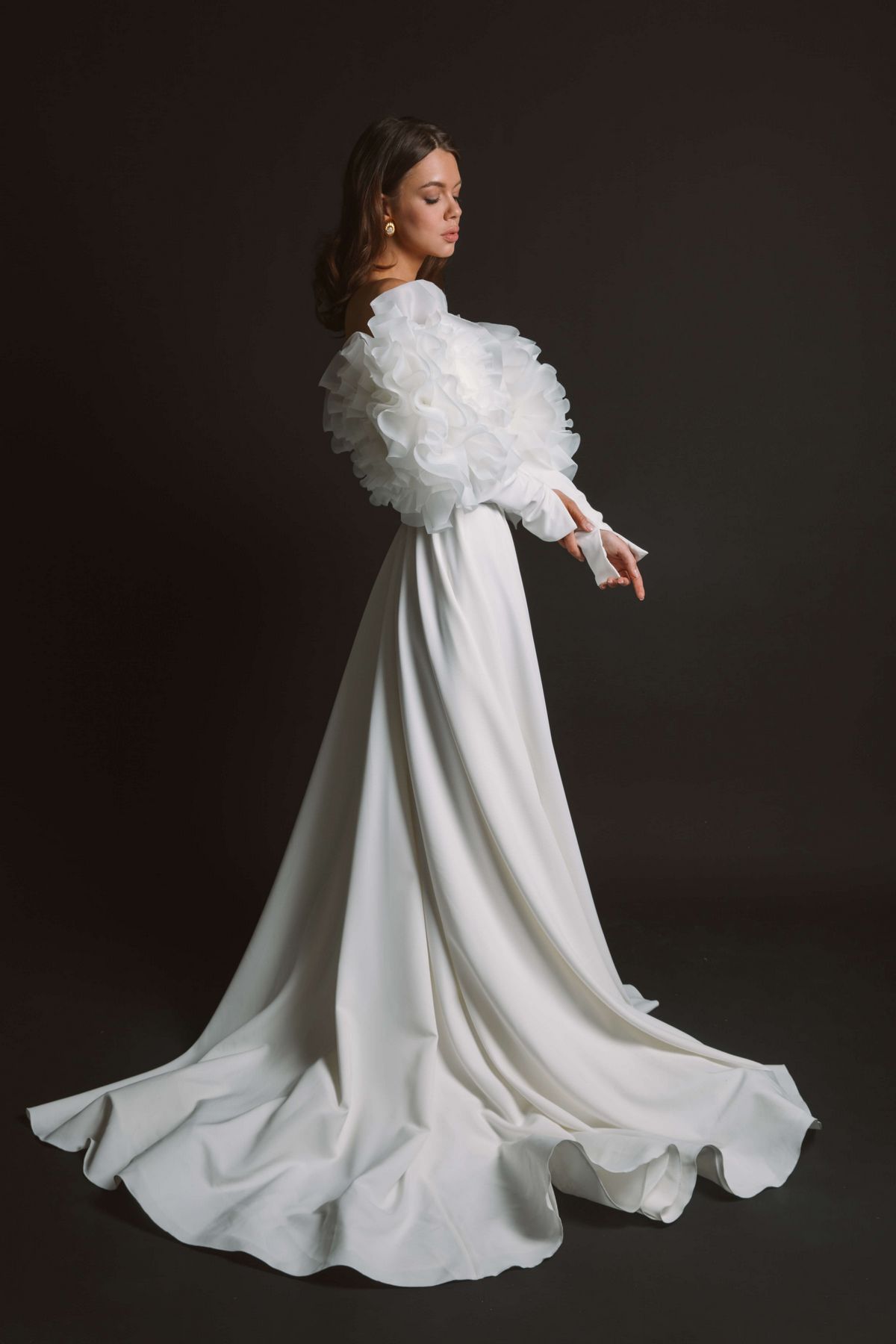 minimalist coututre style wedding dress with volumised sleeves by rara avis designer 1
