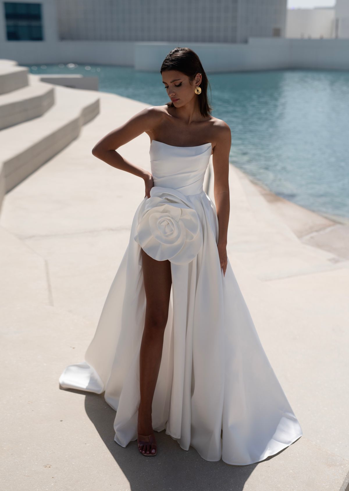 satin wedding dress with the flower and split by romanova atelier, nz 1