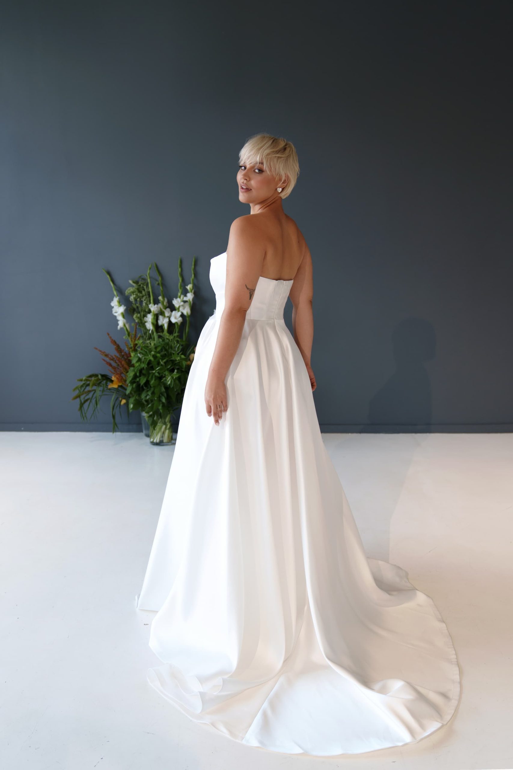 satin wedding dress Diva plus size with the flower and split by romanova atelier, nz 5