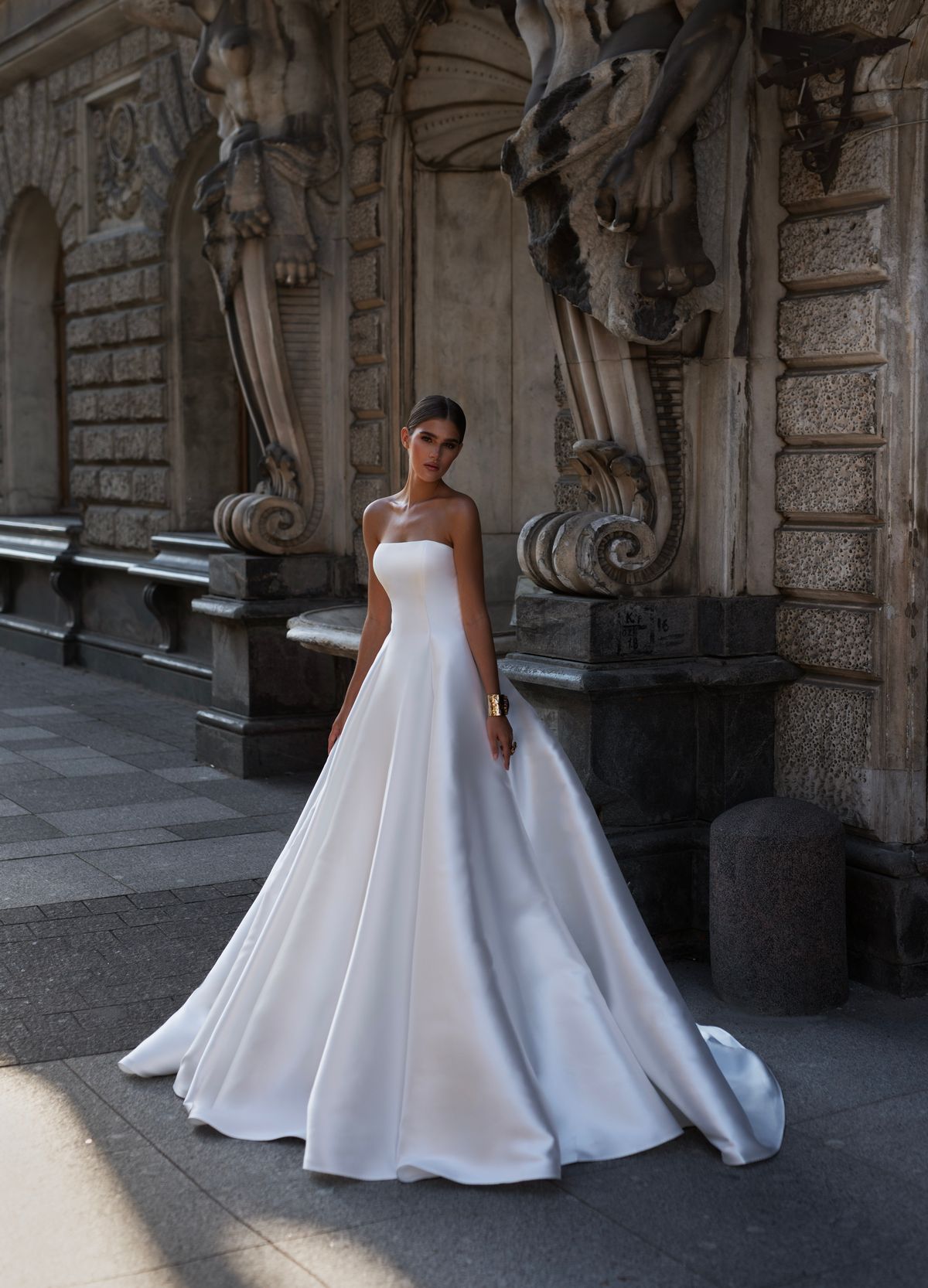 Elegant satin wedding dress Caprio with open back by Patricia Couture at Dell'Amore bridal, Auckland, NZ. 1