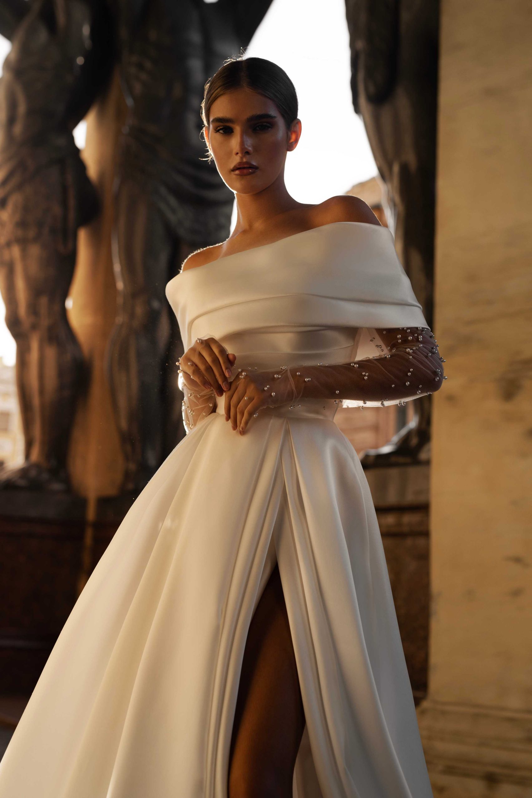 Satin wedding dress Barbel with open shoulders and a slit skirt by Patricia Couture at Dell'Amore Bridal, Auckland, NZ 2