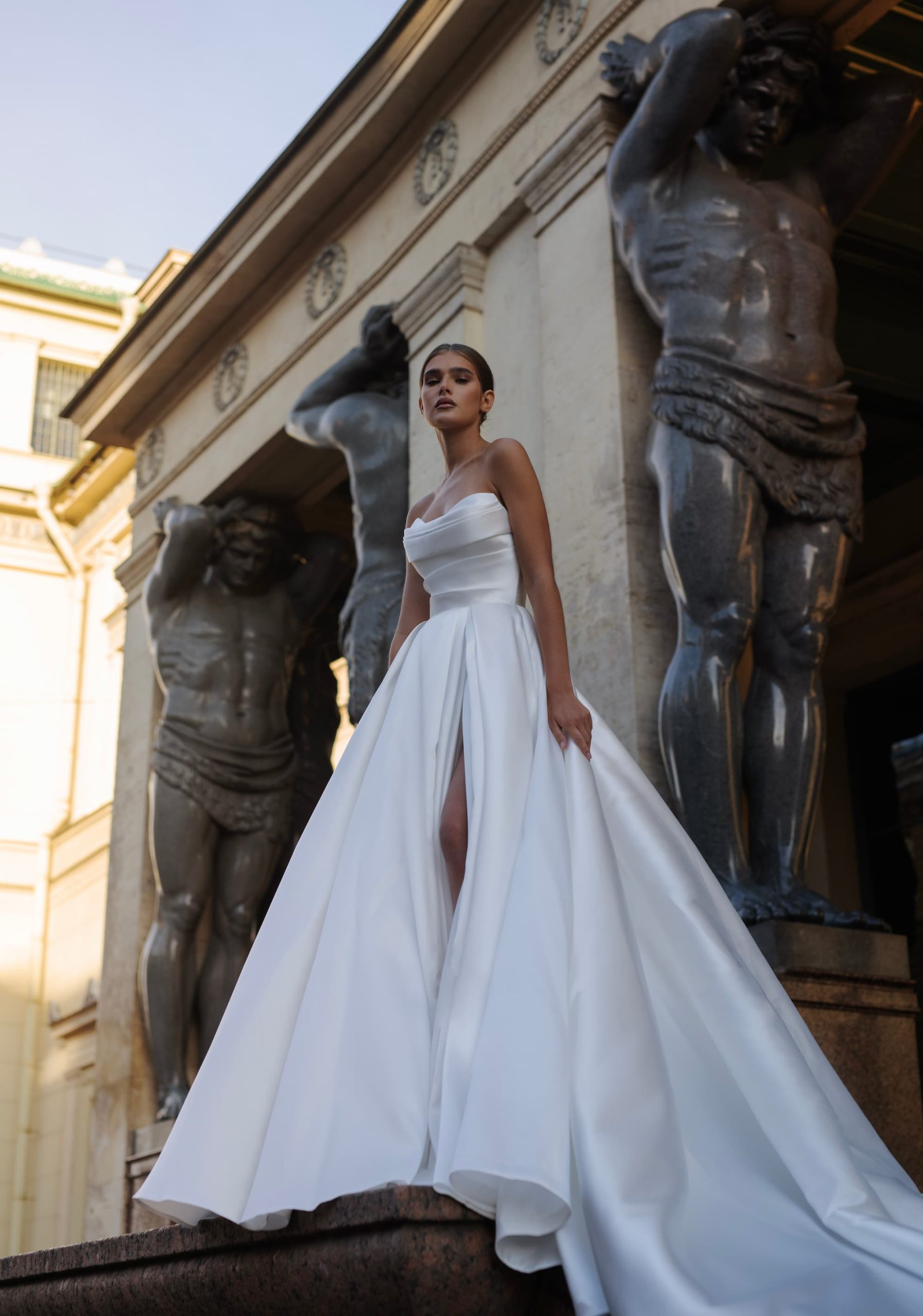 Satin wedding dress Barbel with open shoulders and a slit skirt by Patricia Couture at Dell'Amore Bridal, Auckland, NZ 3