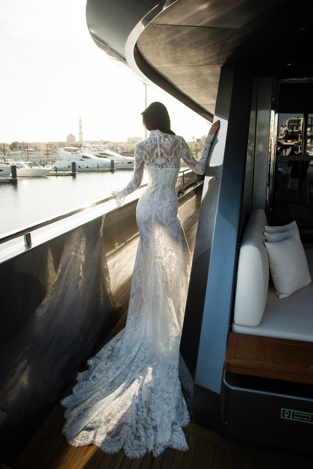 fitted silhouette lace wedding dress Marseille with removable lace bolero by patricia couture at Dell'Amore Bridal, NZ 1