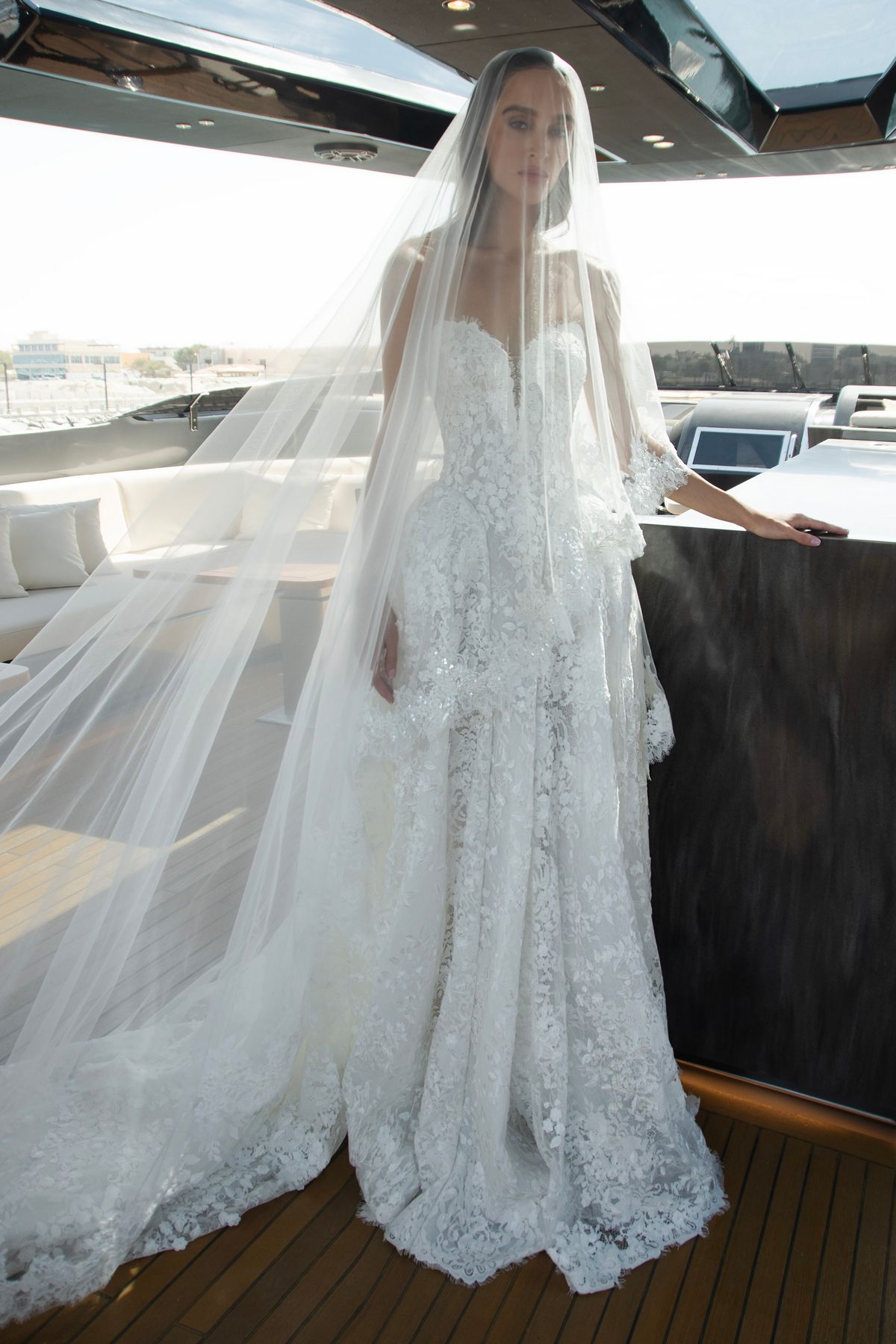 strapless lace wedding dress Venice with basque waist by patricia couture at Dell'Amore Bridal, NZ. 1