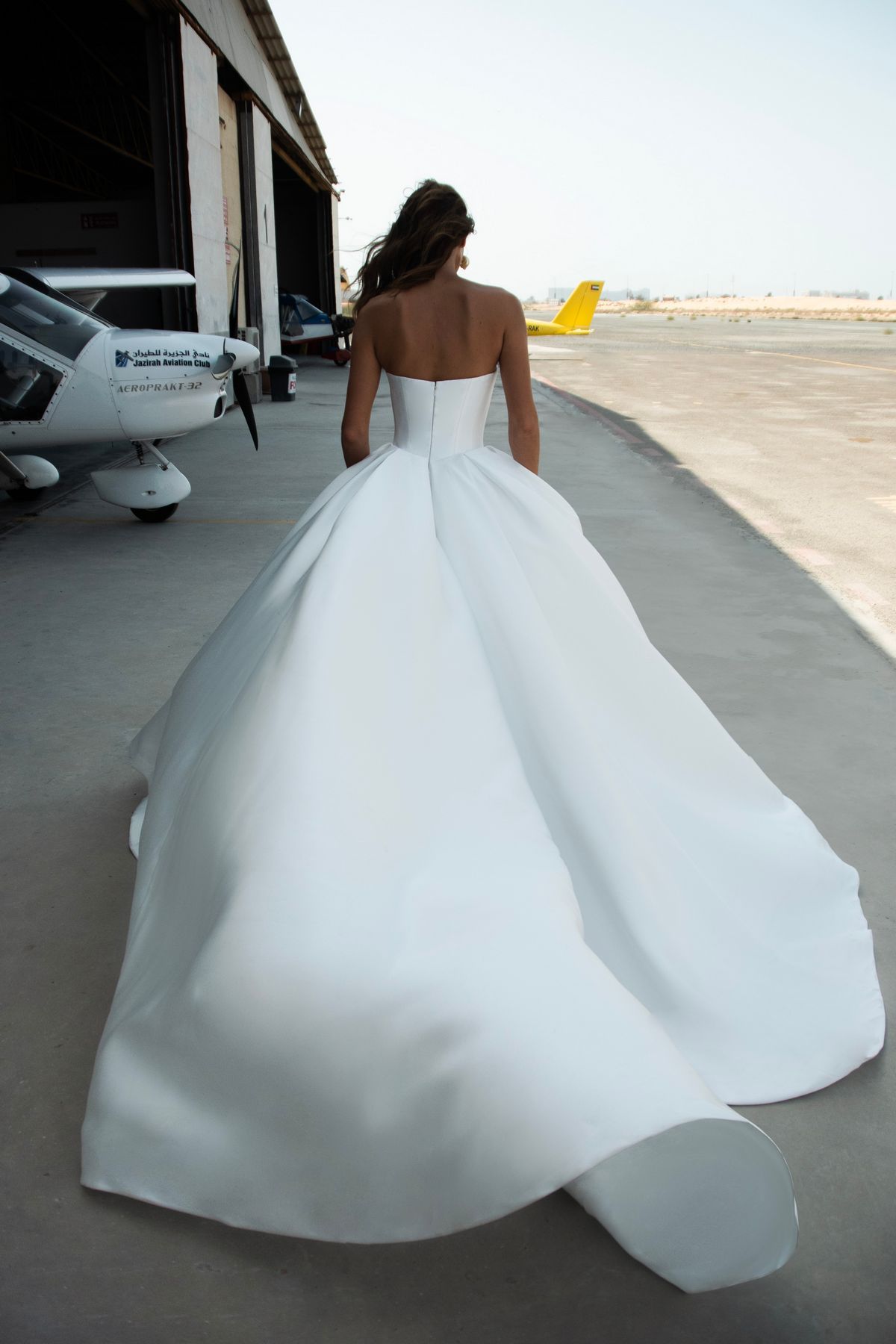Satin strapless wedding dress Vivian with basque wasit and sweetheart neckline by romanova designer at Dell'Amore Bridal, NZ. 3
