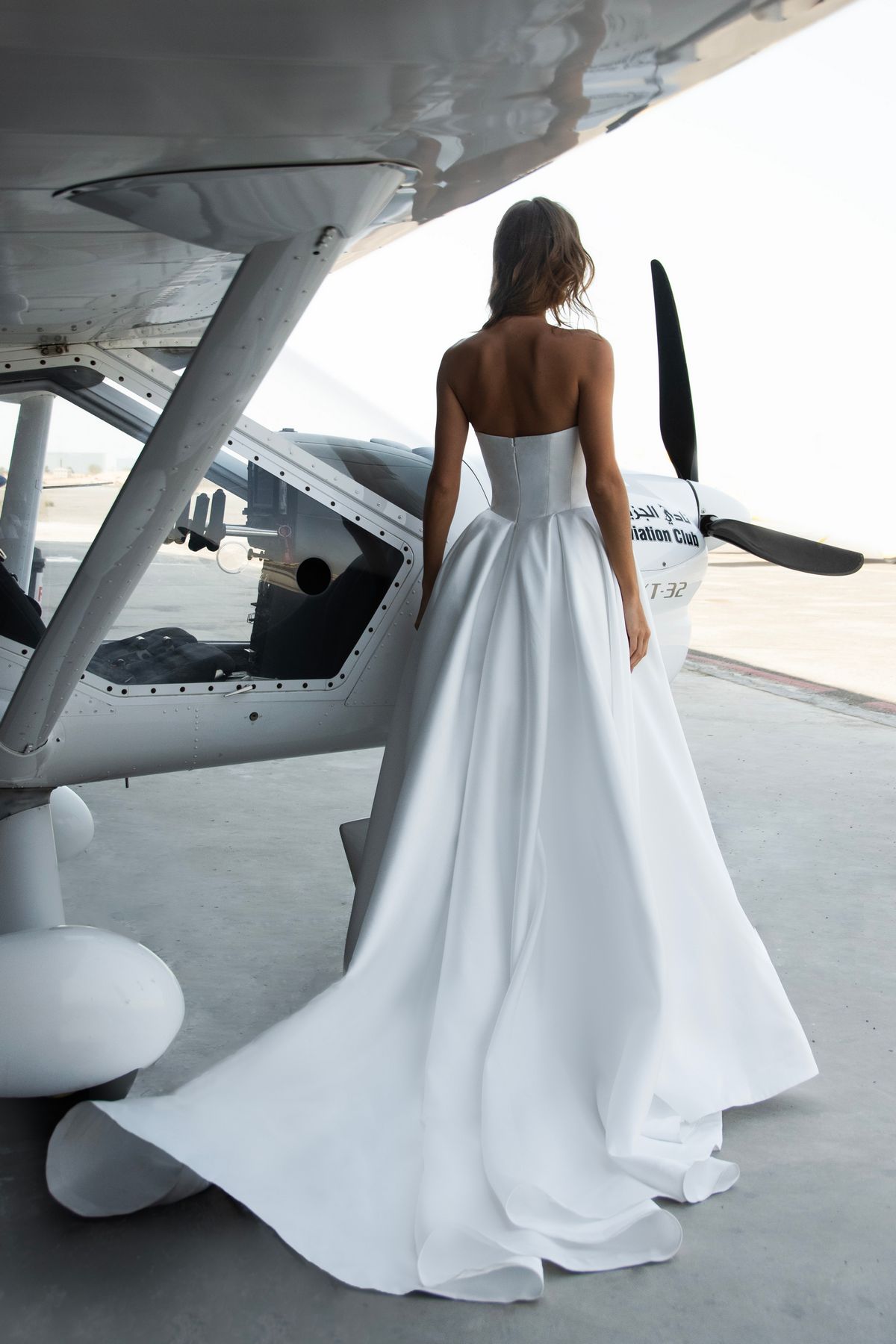 Satin strapless wedding dress Vivian with basque wasit and sweetheart neckline by romanova designer at Dell'Amore Bridal, NZ. 5