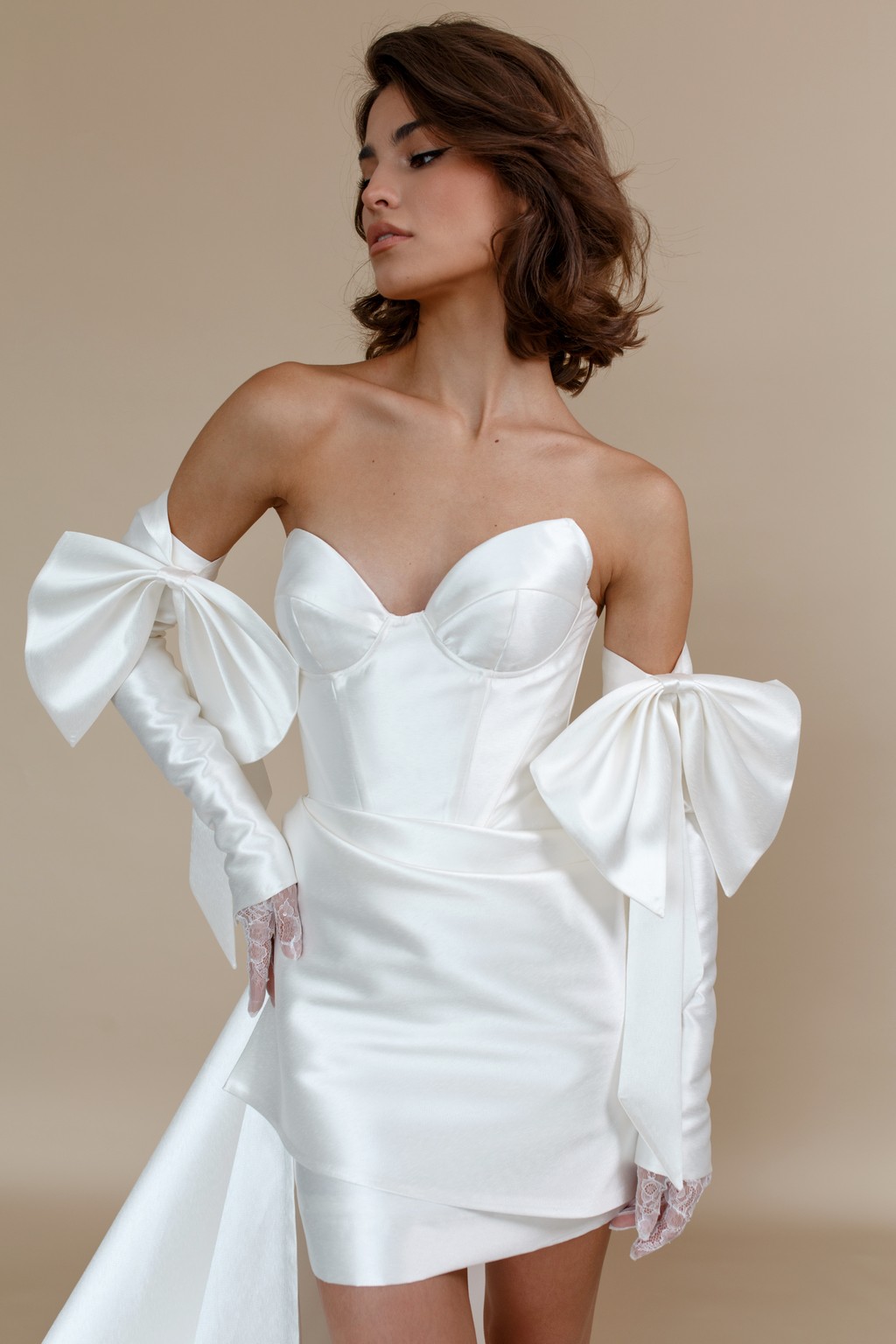 Fitted mini wedding dress Cancer with sharply outlined cups by rara avis at Dell'Amore Bridal, NZ 4