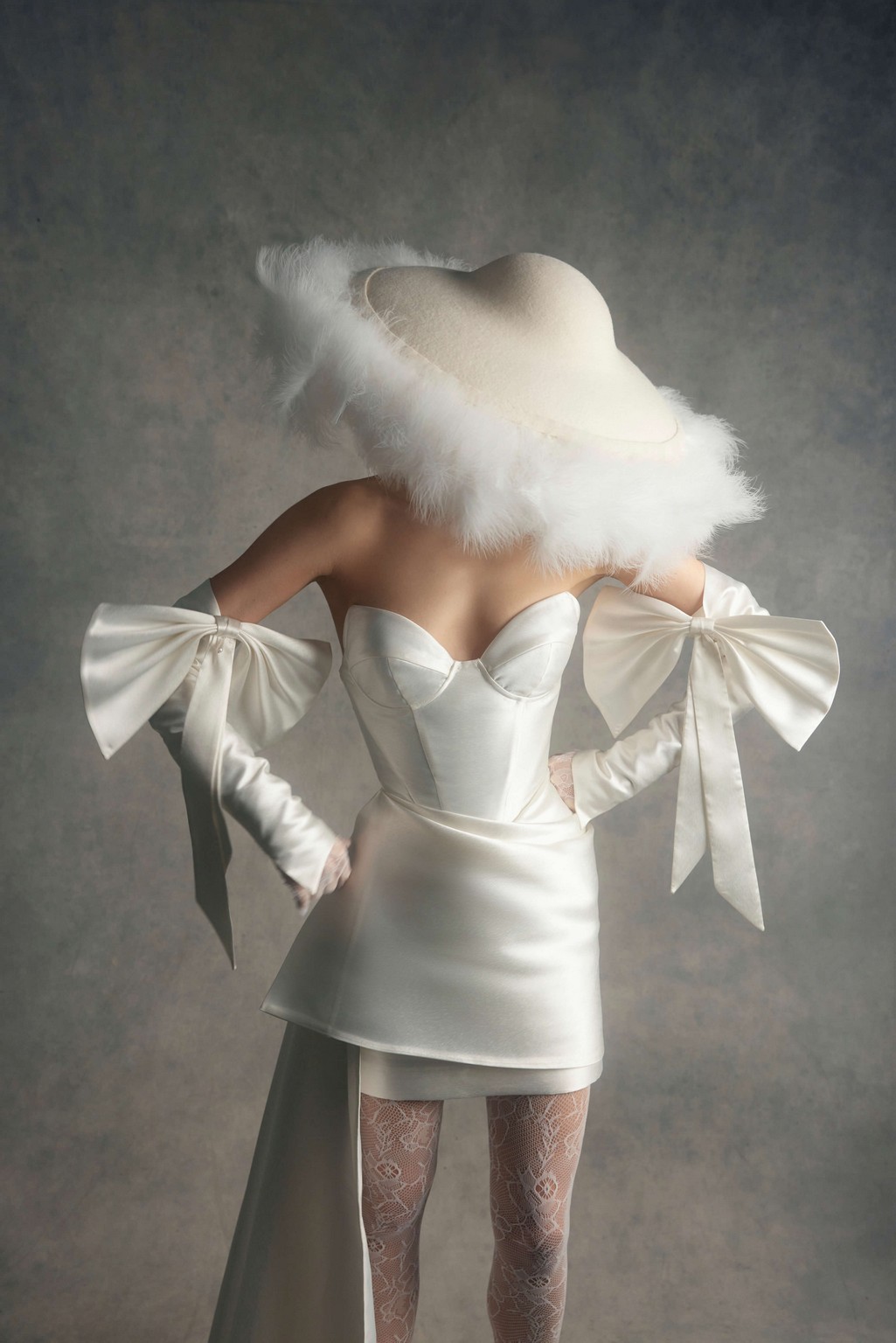 Fitted mini wedding dress Cancer with sharply outlined cups by rara avis at Dell'Amore Bridal, NZ 2