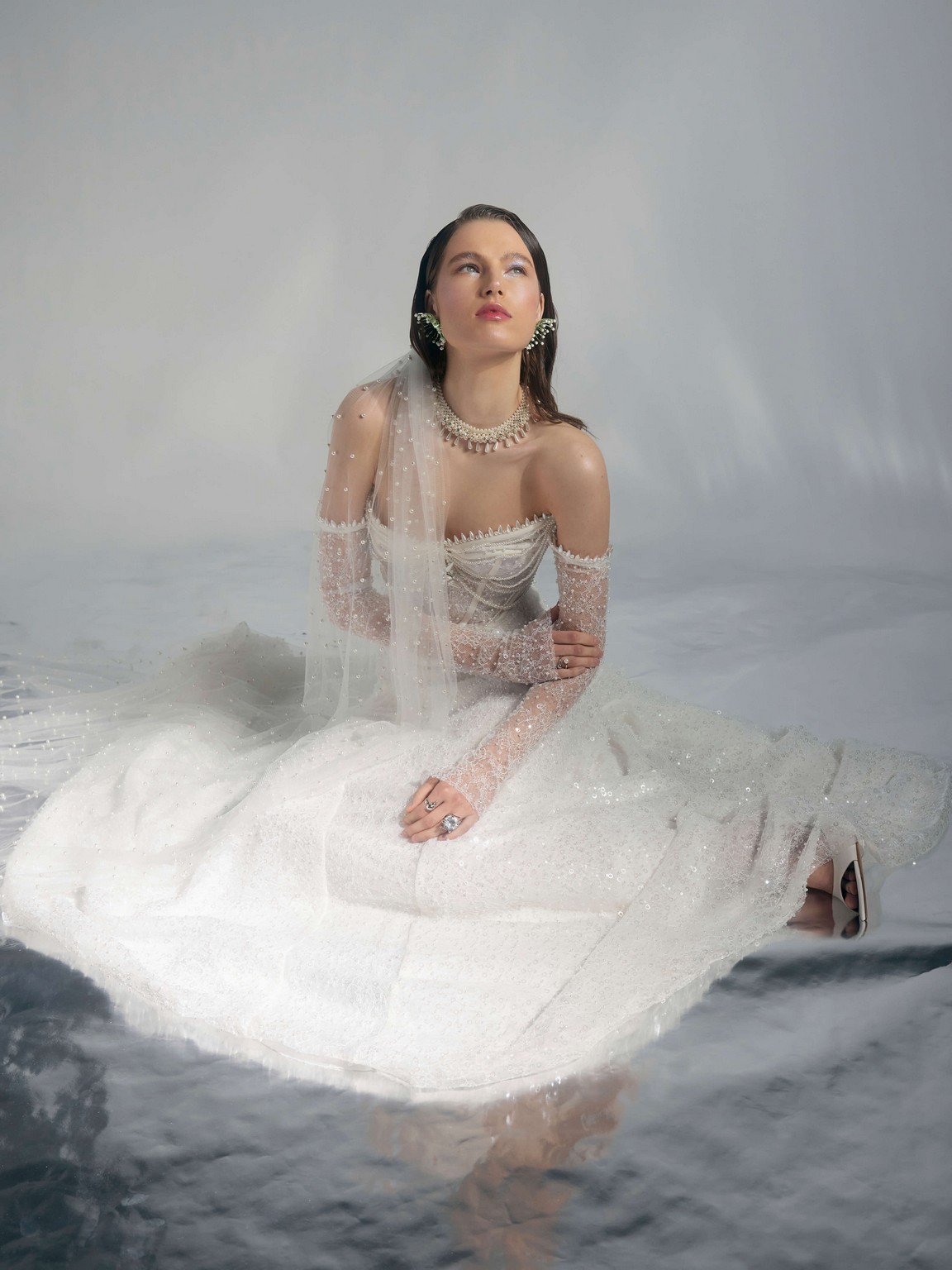 Lace long sleeves wedding dress Poisson decorated with pearls by rara avis at Dell'Amore Bridal, NZ. 2