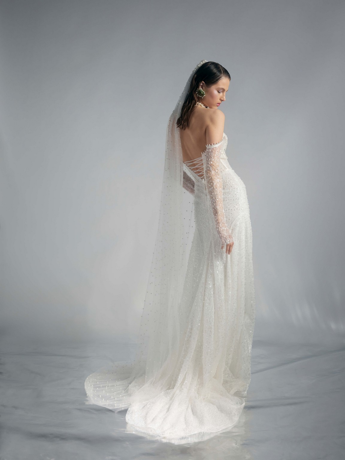 Lace long sleeves wedding dress Poisson decorated with pearls by rara avis at Dell'Amore Bridal, NZ. 1