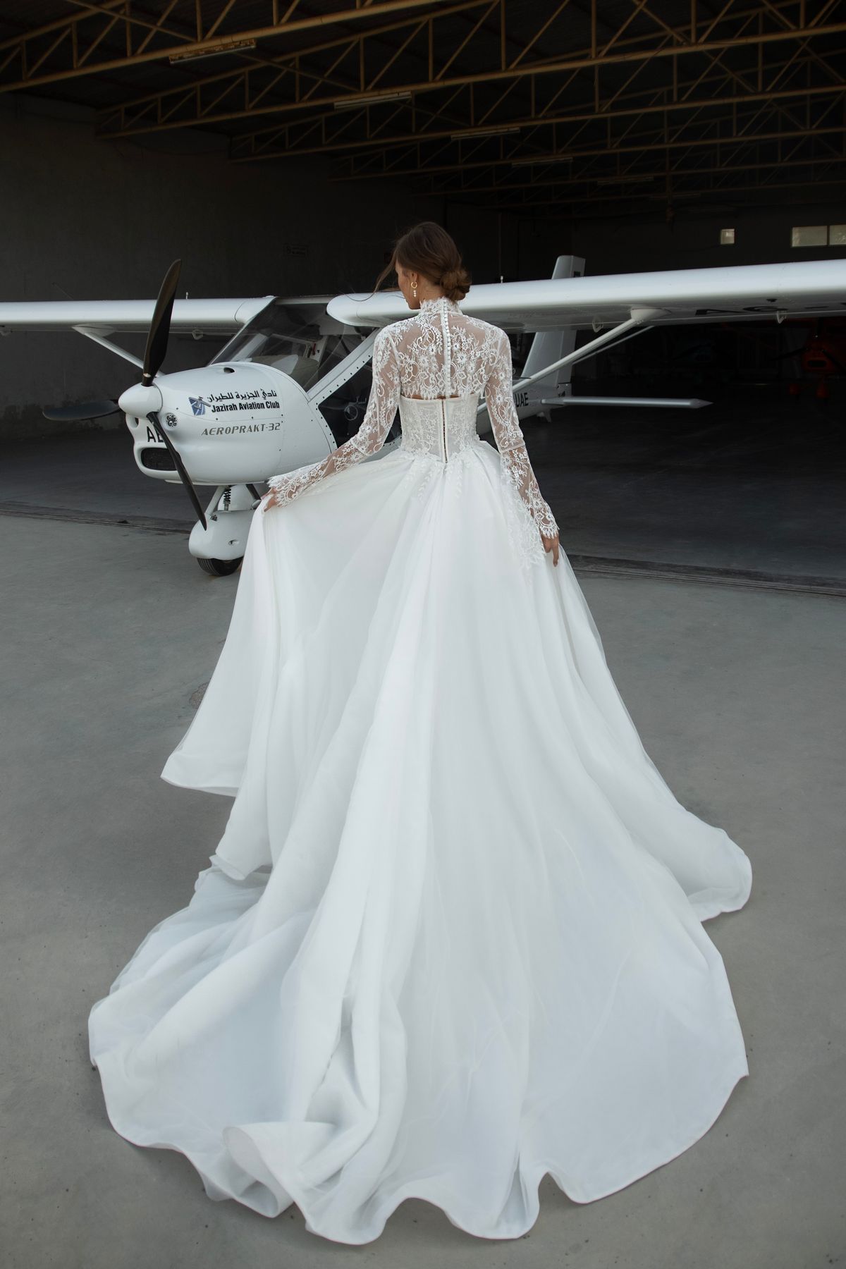 Sweetheart lace satin wedding dress Leontine with basque waist and long lace sleeves by romanova designer at Dell'Amore Bridal, NZ. 1