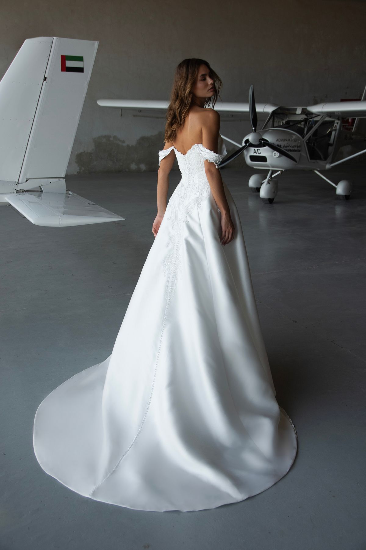 Embroidered satin wedding dress Frau with beaded and lace corset with off the shoulders sleeevs by romanova designer at Dell'Amore Bridal, NZ. 2