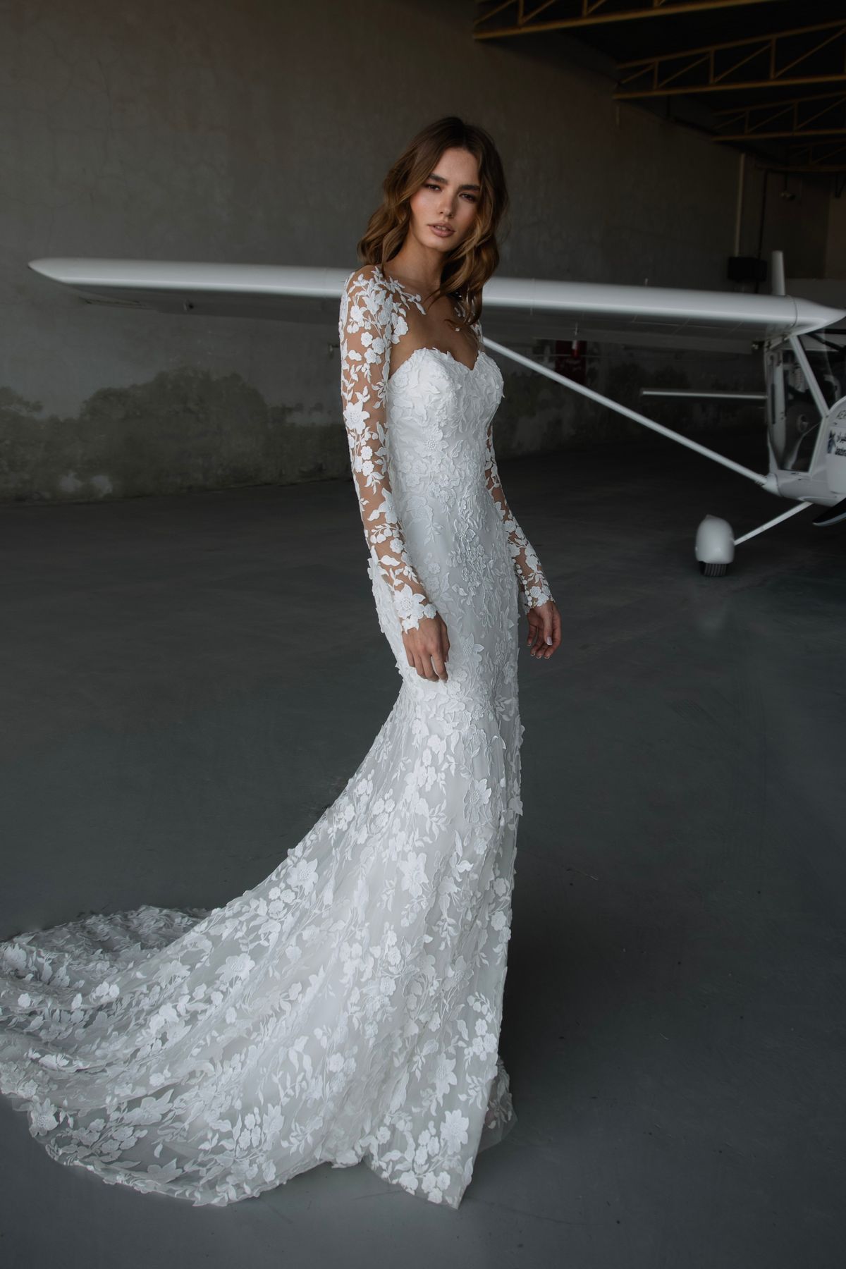 Fitted white lace wedding dress Luminara with lace sleeves bolero and scarf by romanova designer at Dell'Amore Bridal, NZ. 4