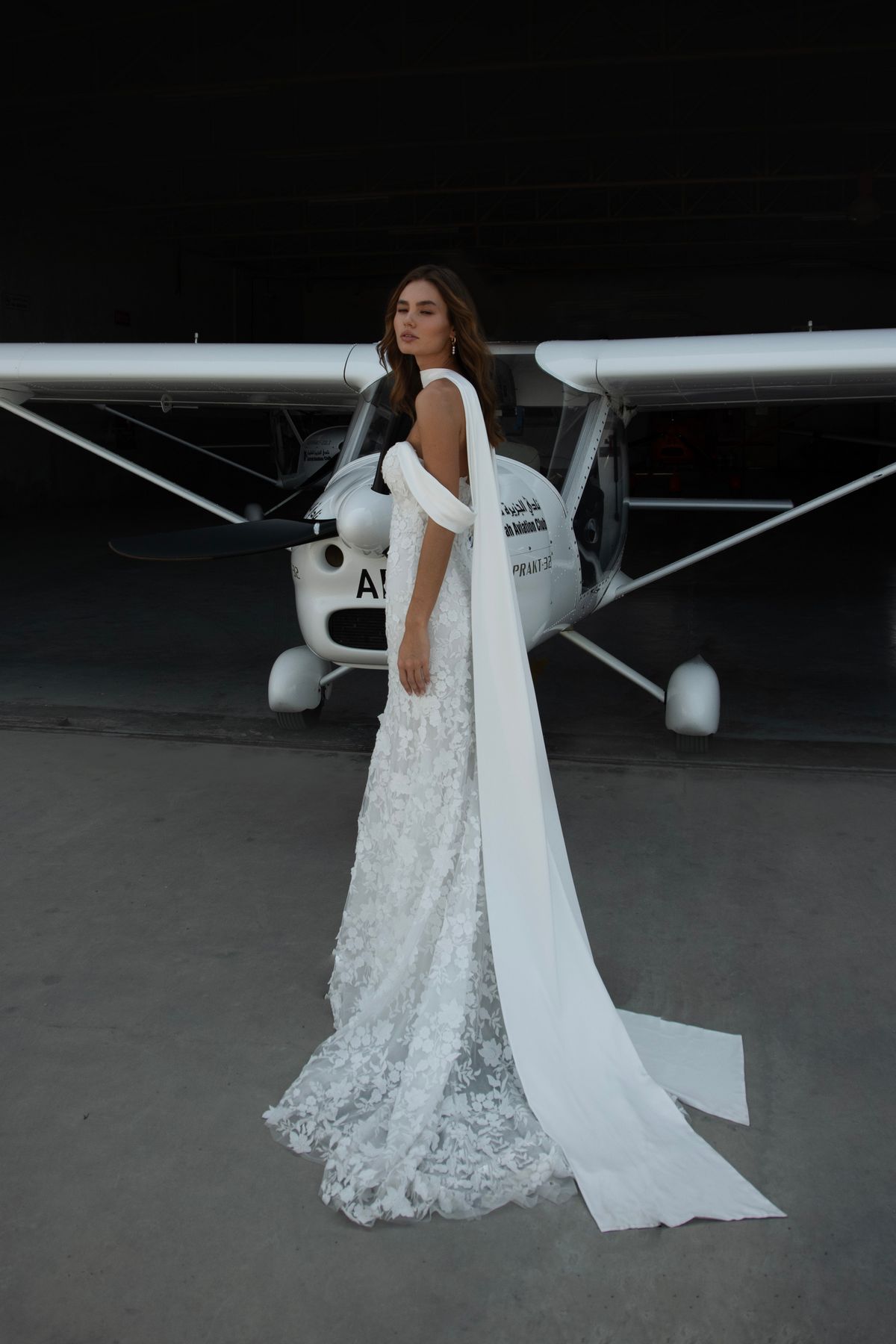 Fitted white lace wedding dress Luminara with lace sleeves bolero and scarf by romanova designer at Dell'Amore Bridal, NZ. 7