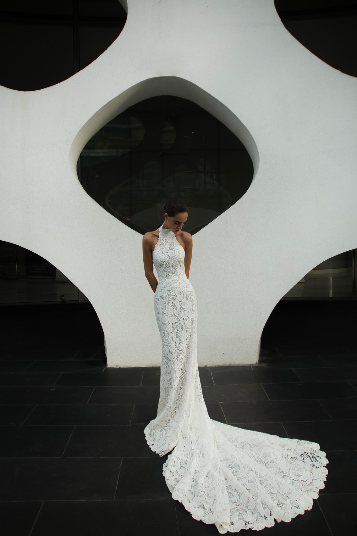 Lace fit and flare wedding dress Denise with halter neckline by patricia couture at Dell'Amore Bridal, NZ. 5