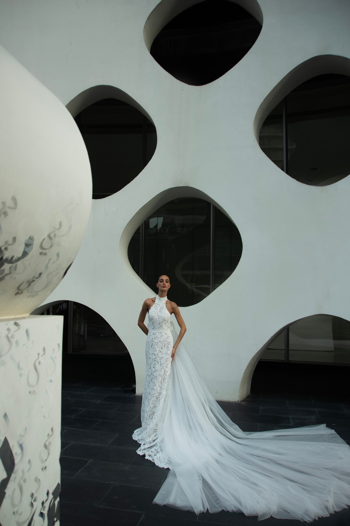 Lace fit and flare wedding dress Denise with halter neckline by patricia couture at Dell'Amore Bridal, NZ. 1